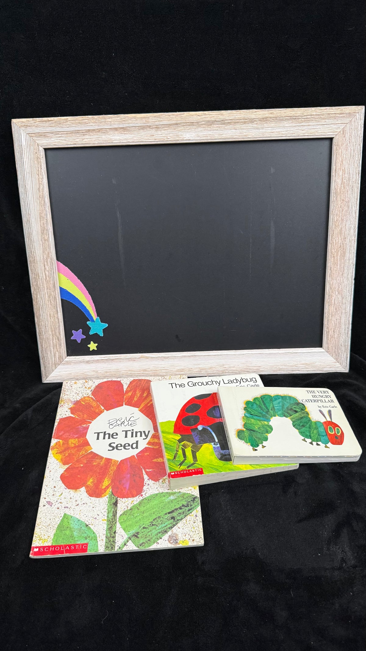 The three Eric Carle books laid out to show each cover