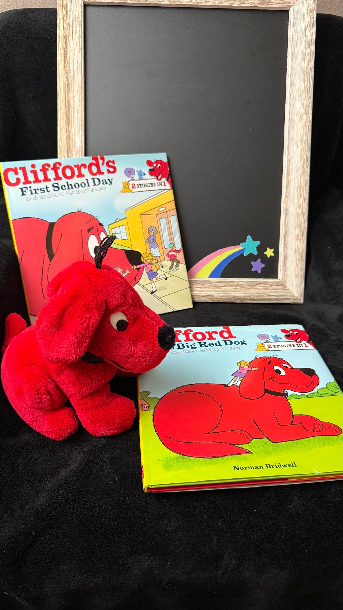Two Clifford 2 Stories in 1 book covers with red Clifford plush toy