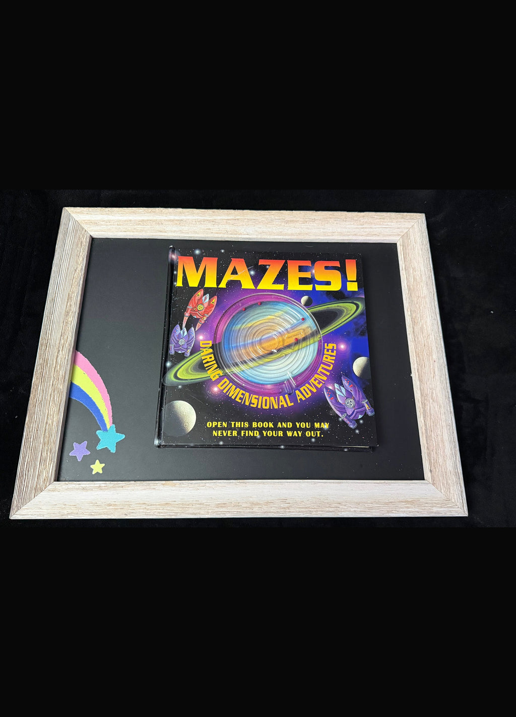 MAZES! Daring Dimensional Adventures cover in driftwood frame prop