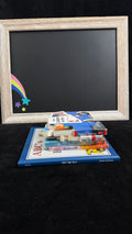 Rainbow Joy Book Shop Red bundle flat lay, vehicle-themed board books