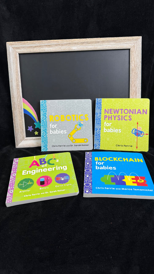 Baby STEM board book bundle flat lay with chalkboard rainbow prop