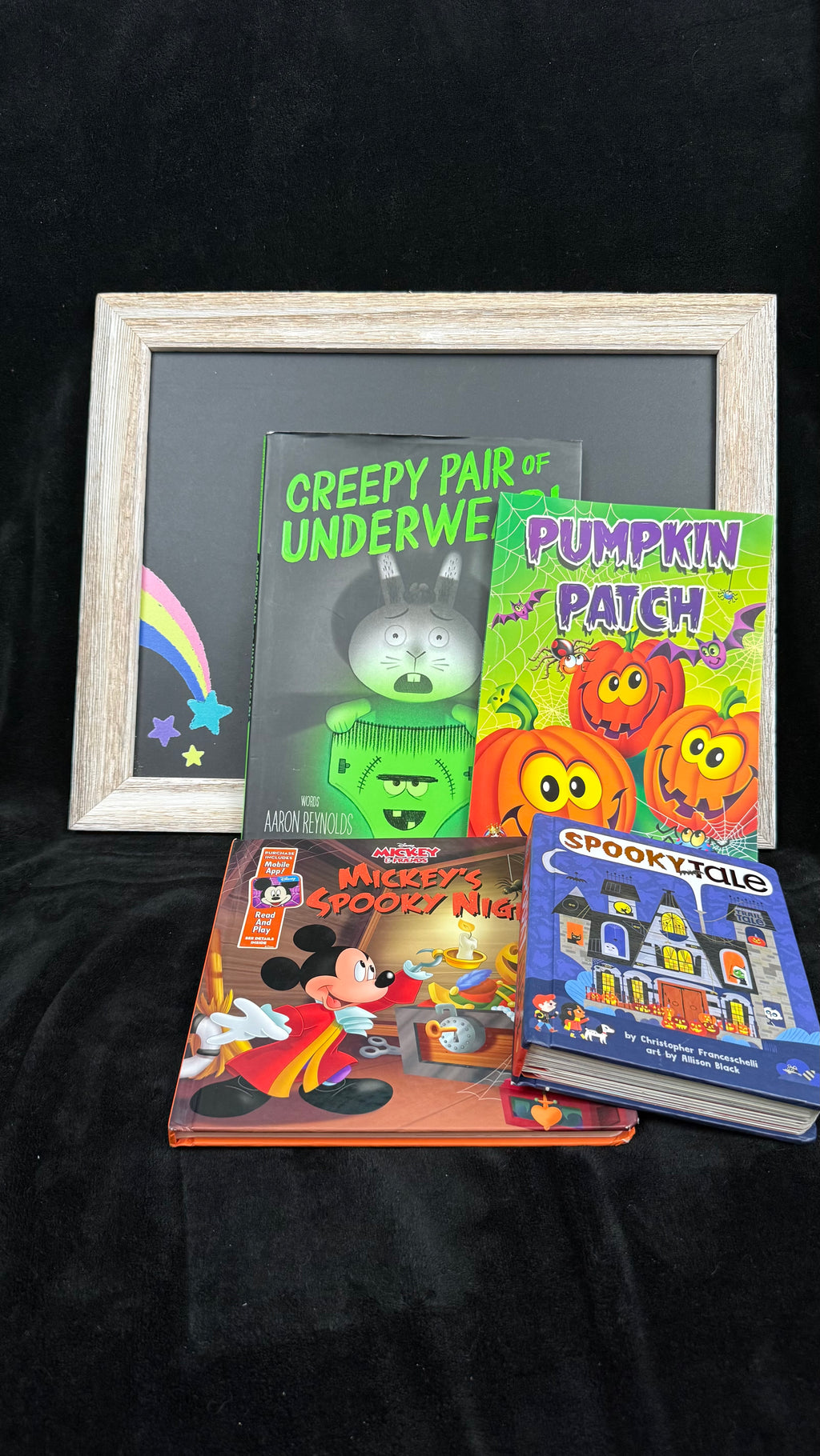 All four books in the Halloween Story Stack bundle arranged to show each cover