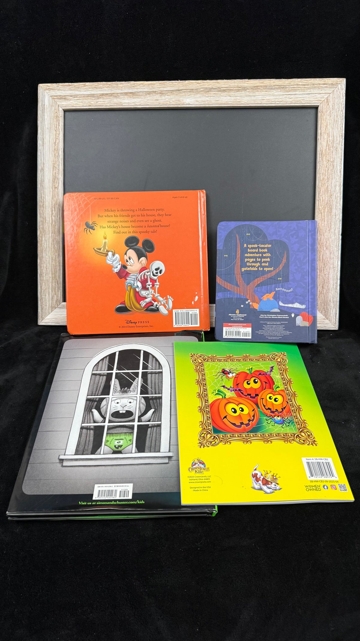 Back covers of all four books in the Halloween Story Stack bundle