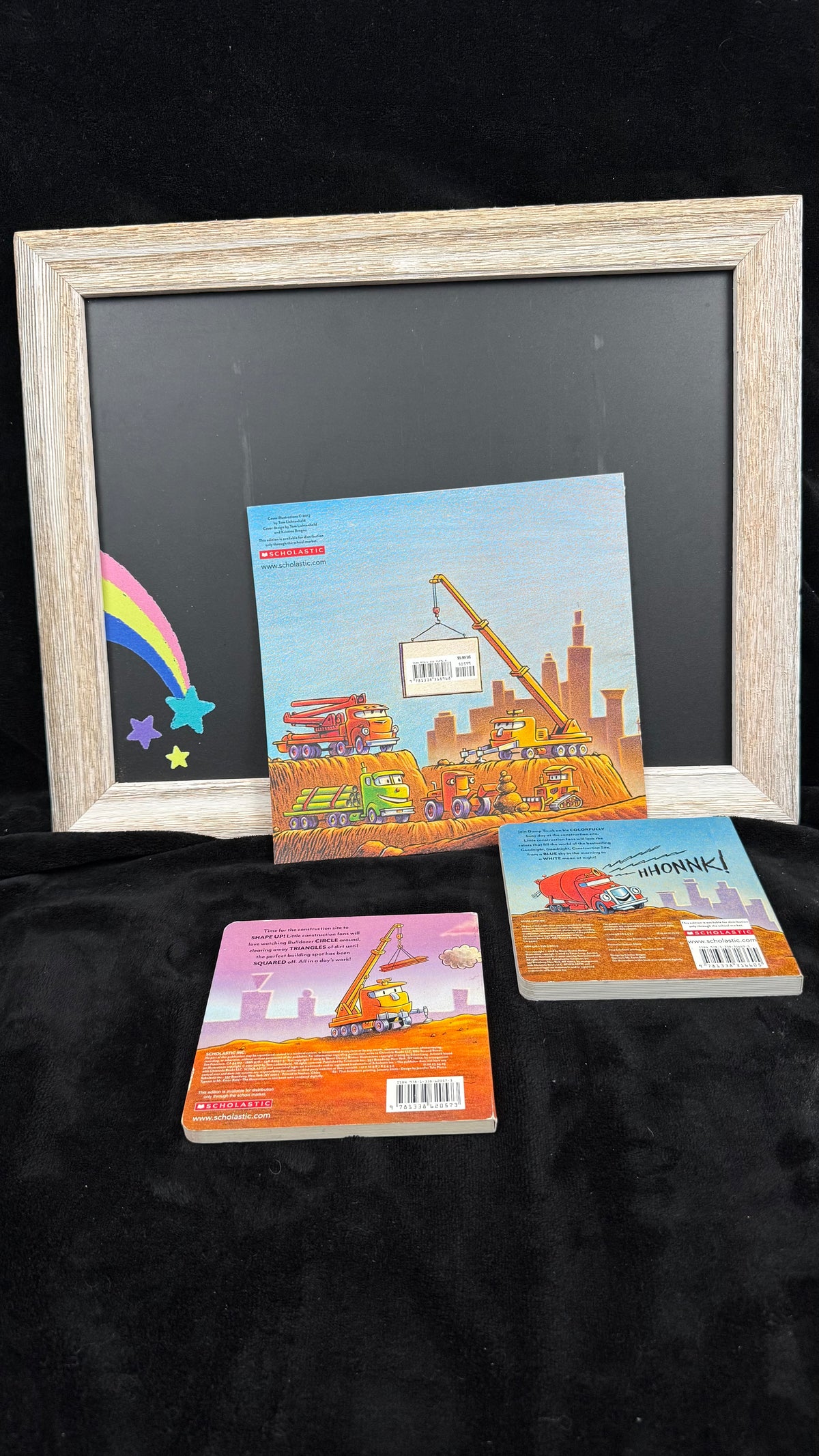 Back covers of the three construction site books